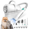 White pet grooming vacuum and clipper kit with vacuum hose, comb attachments, and nozzle