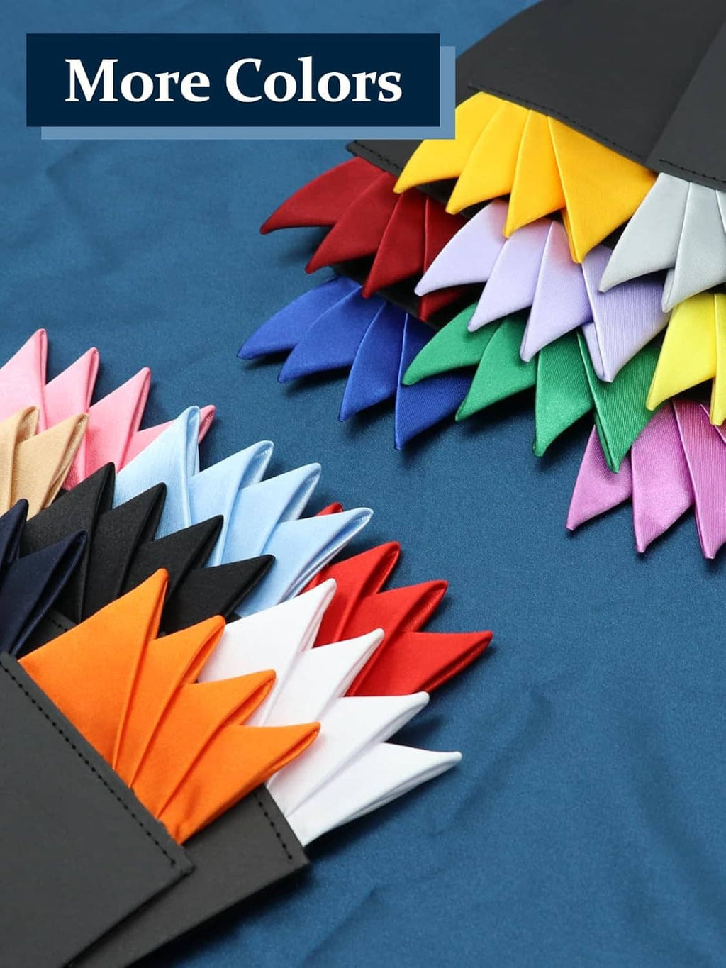 Assorted colored pre-folded pocket squares fanned out with a black sleeve corner