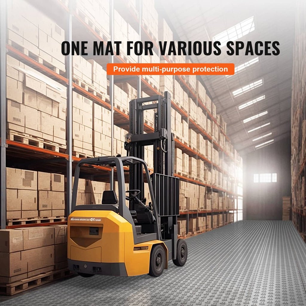 Gray interlocking garage floor tiles laid across an indoor storage aisle