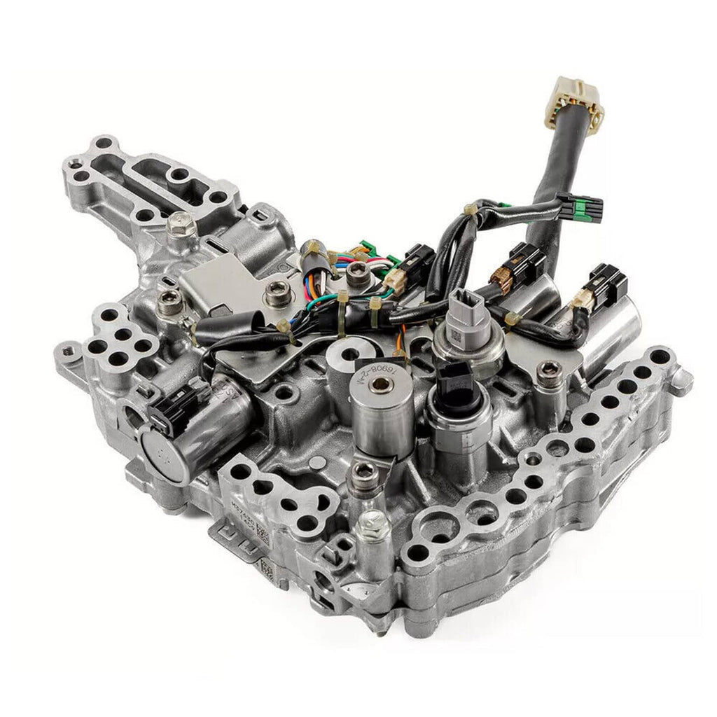 CVT transmission control valve body with solenoids and wiring harness, angled view of metal housing.