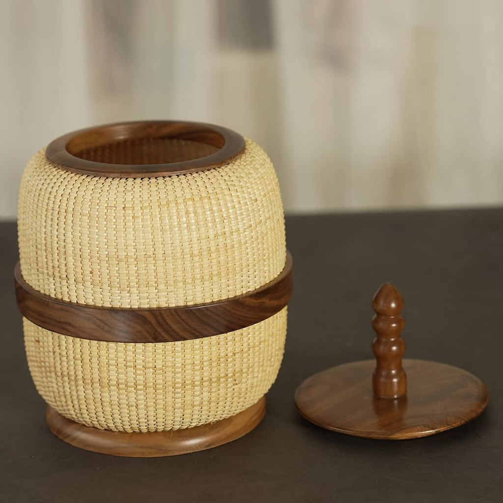 Woven rattan storage basket with wooden lid and finial, yellow beige