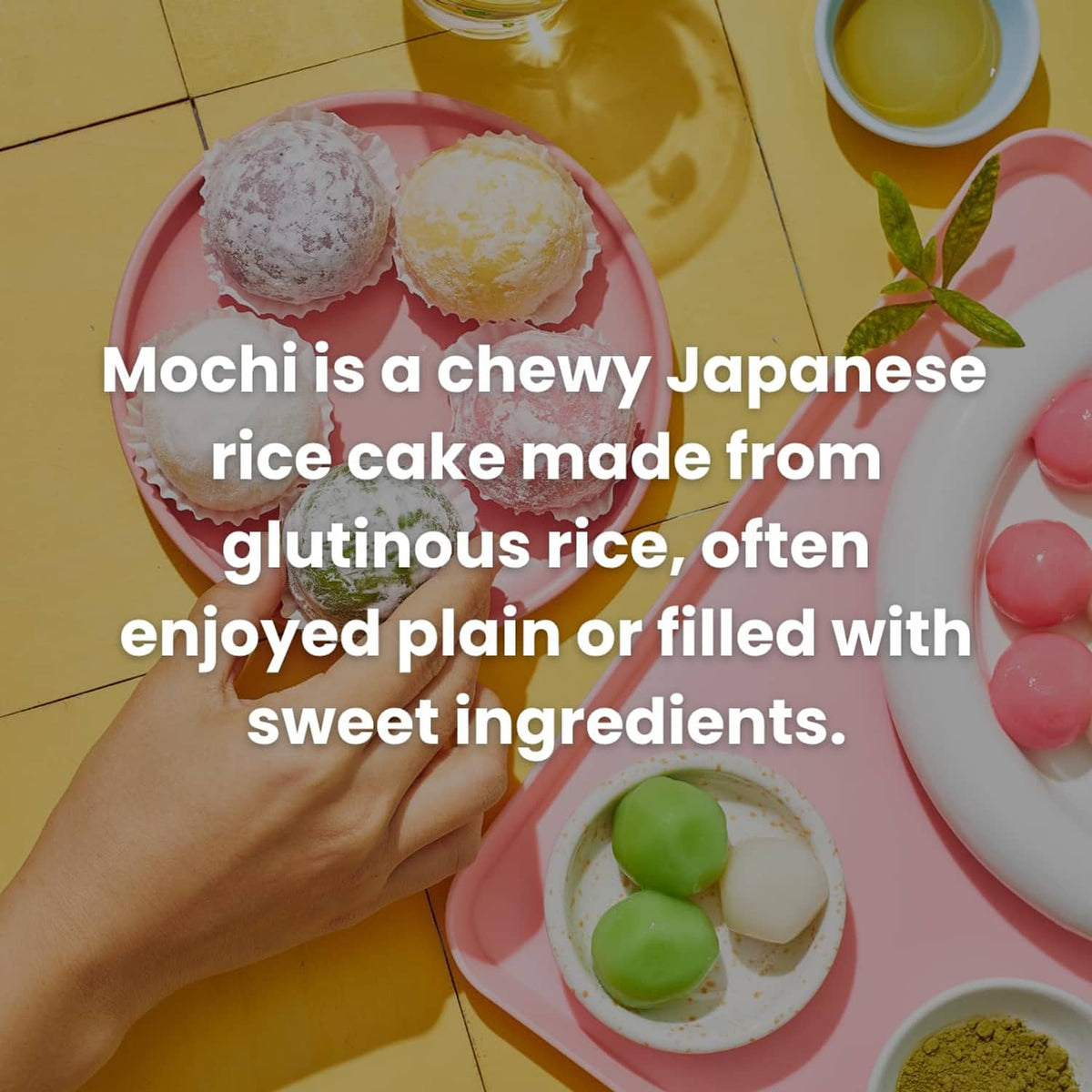 Pink tray with mochi rice cakes and green matcha-filled pieces