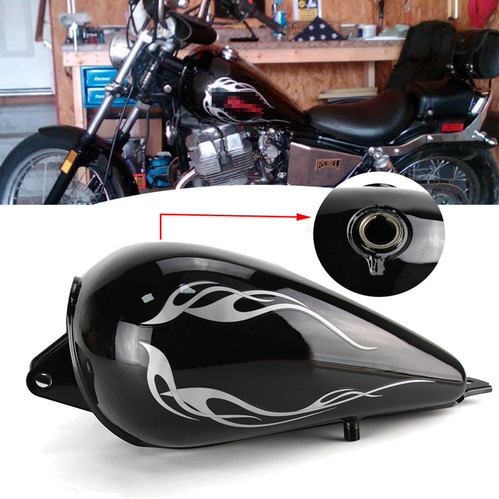 Black fuel tank with silver flame graphics, round fuel cap, and mounting points