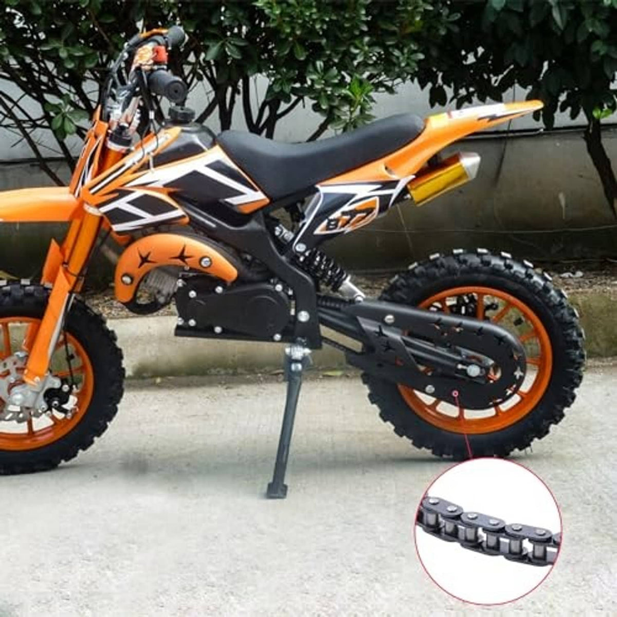 Orange and black mini dirt bike showing a dark blue drive chain along the side