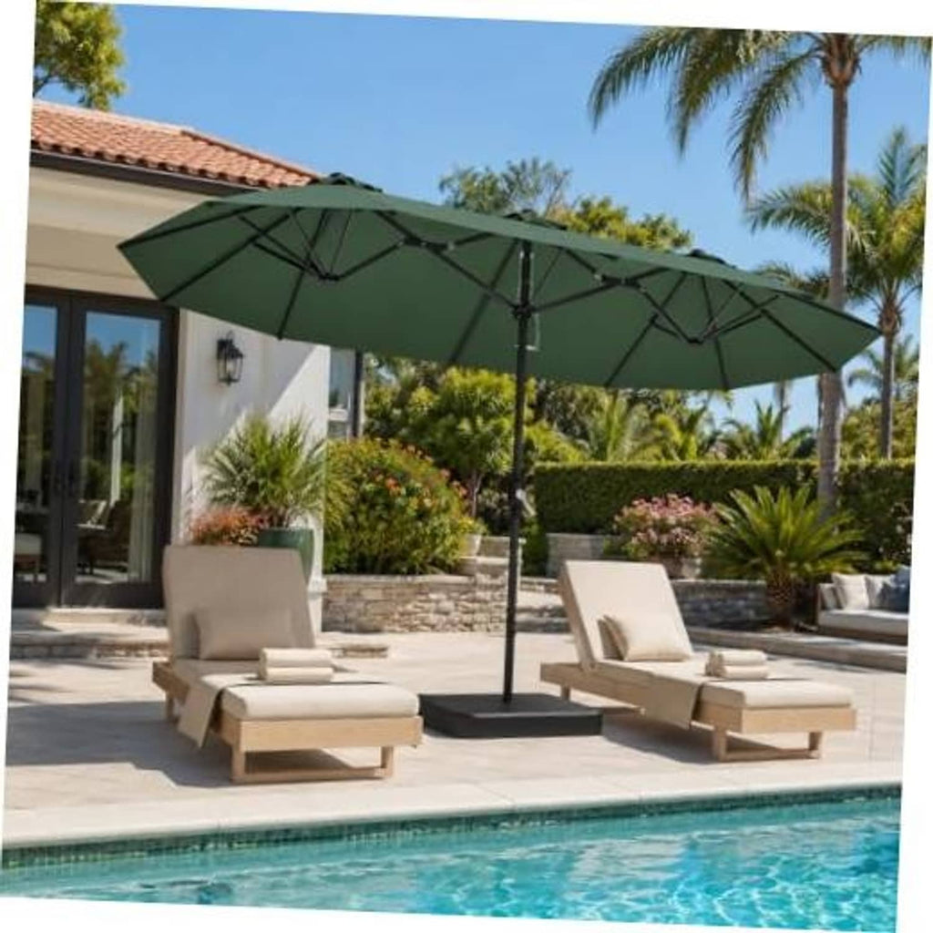 Dark green patio umbrella with open canopy and metal pole beside outdoor lounge chairs