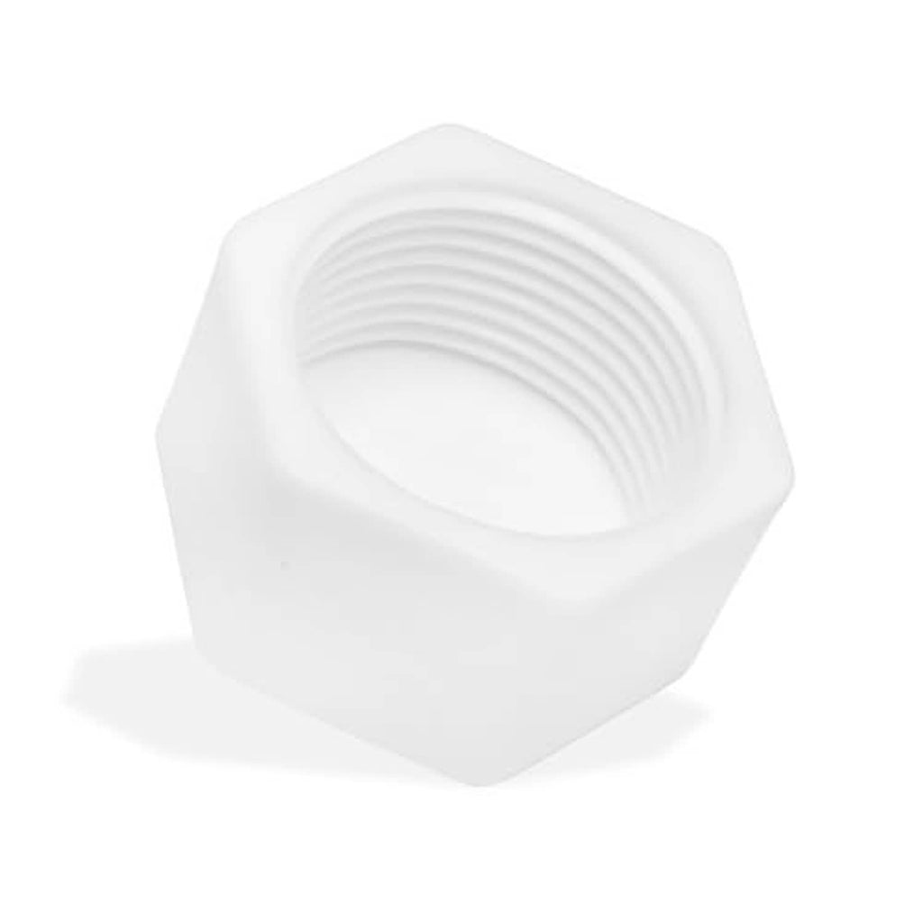 White PVC pipe cap with visible ridged internal threads in hex housing