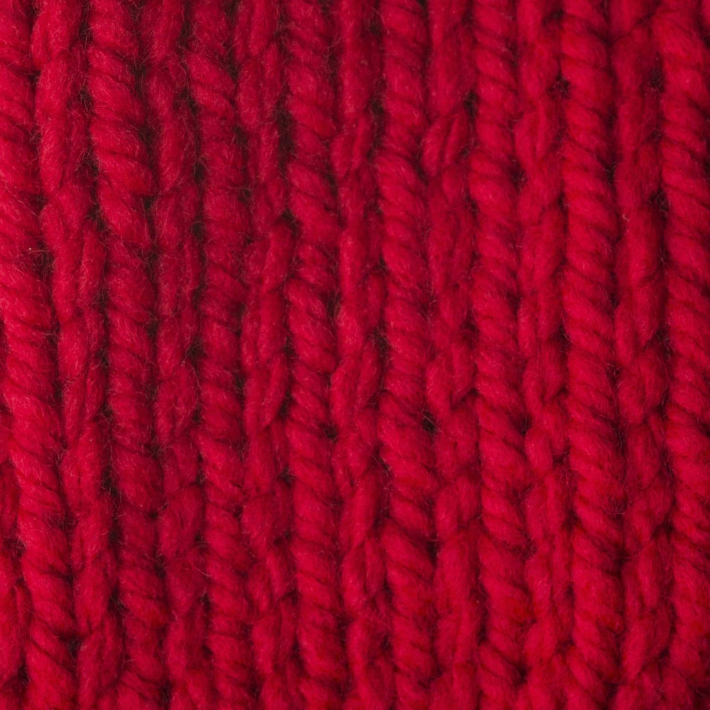 Berry red chunky yarn texture close-up with thick looped knit pattern