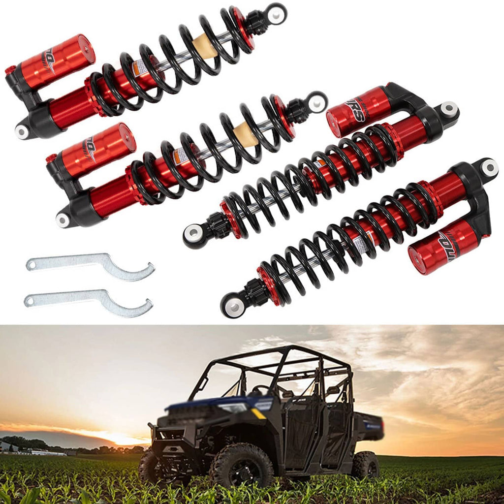 Set of red and black shock absorbers with coil springs and rocker-style mounting brackets
