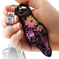 MUNIO self defense keychain, black floral patterned blade with keyring and logo