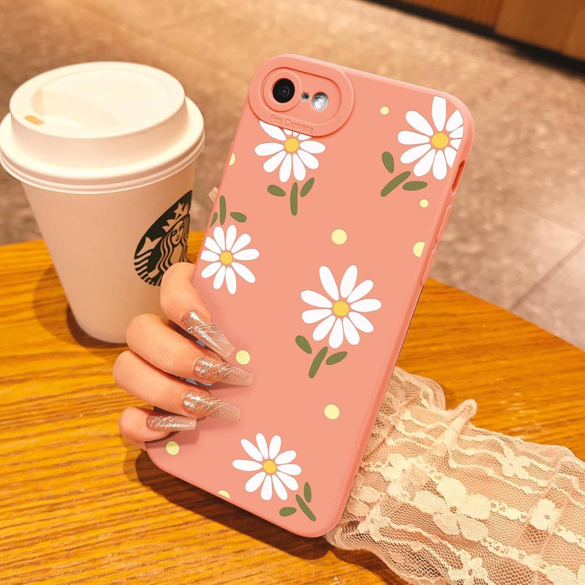 Pink phone case for iPhone SE/8/7 with daisy print, camera and speaker openings