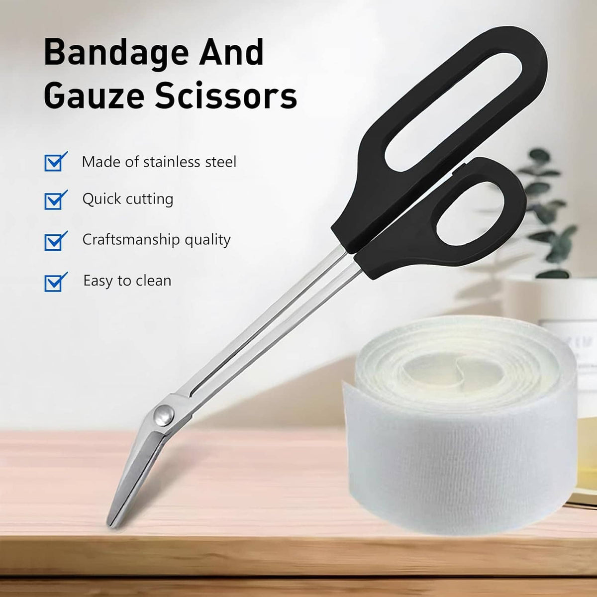 Bandage and gauze scissors with pointed stainless blades and black handle loops