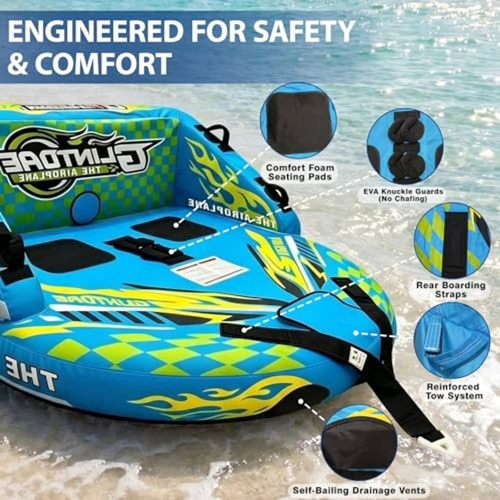 Inflatable towable tube with front boarding straps, comfort foam pads, and drainage vents