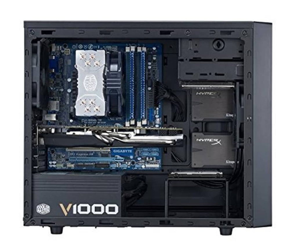Open mini tower PC case showing motherboard, RAM slots, and installed GPU