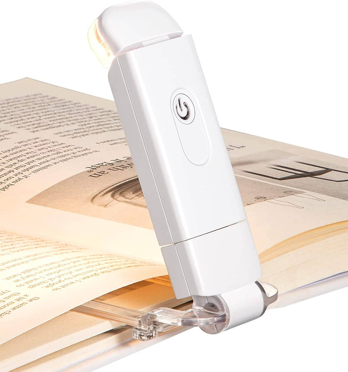 White rechargeable clip-on LED book light clipped to an open book with clear base