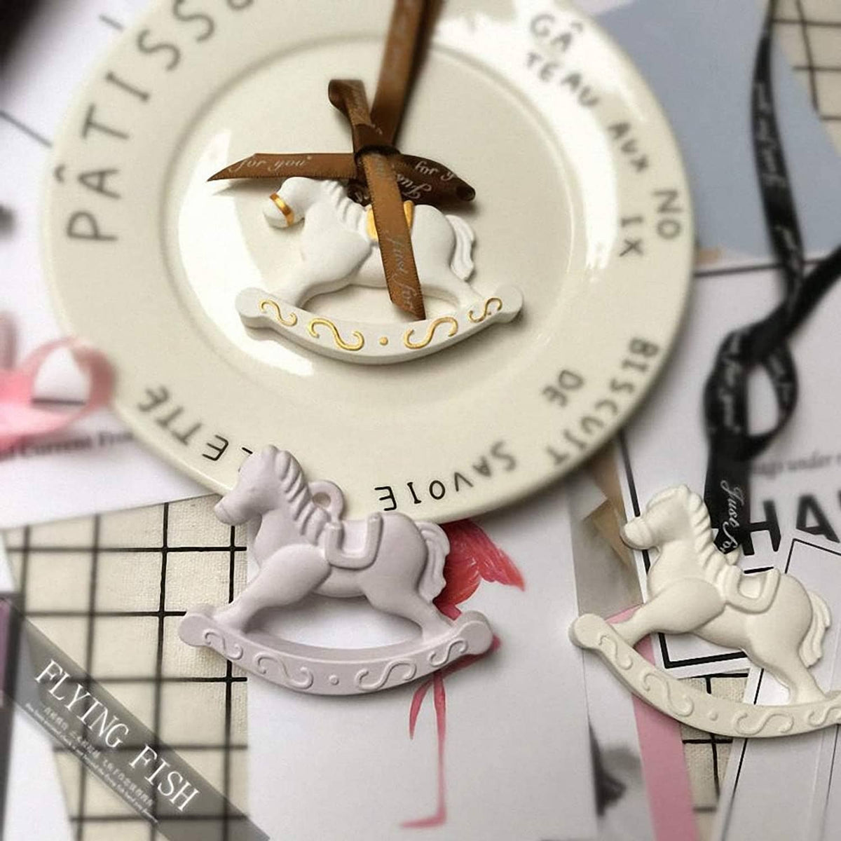 Rocking horse candy pieces arranged on a plate for decoration.