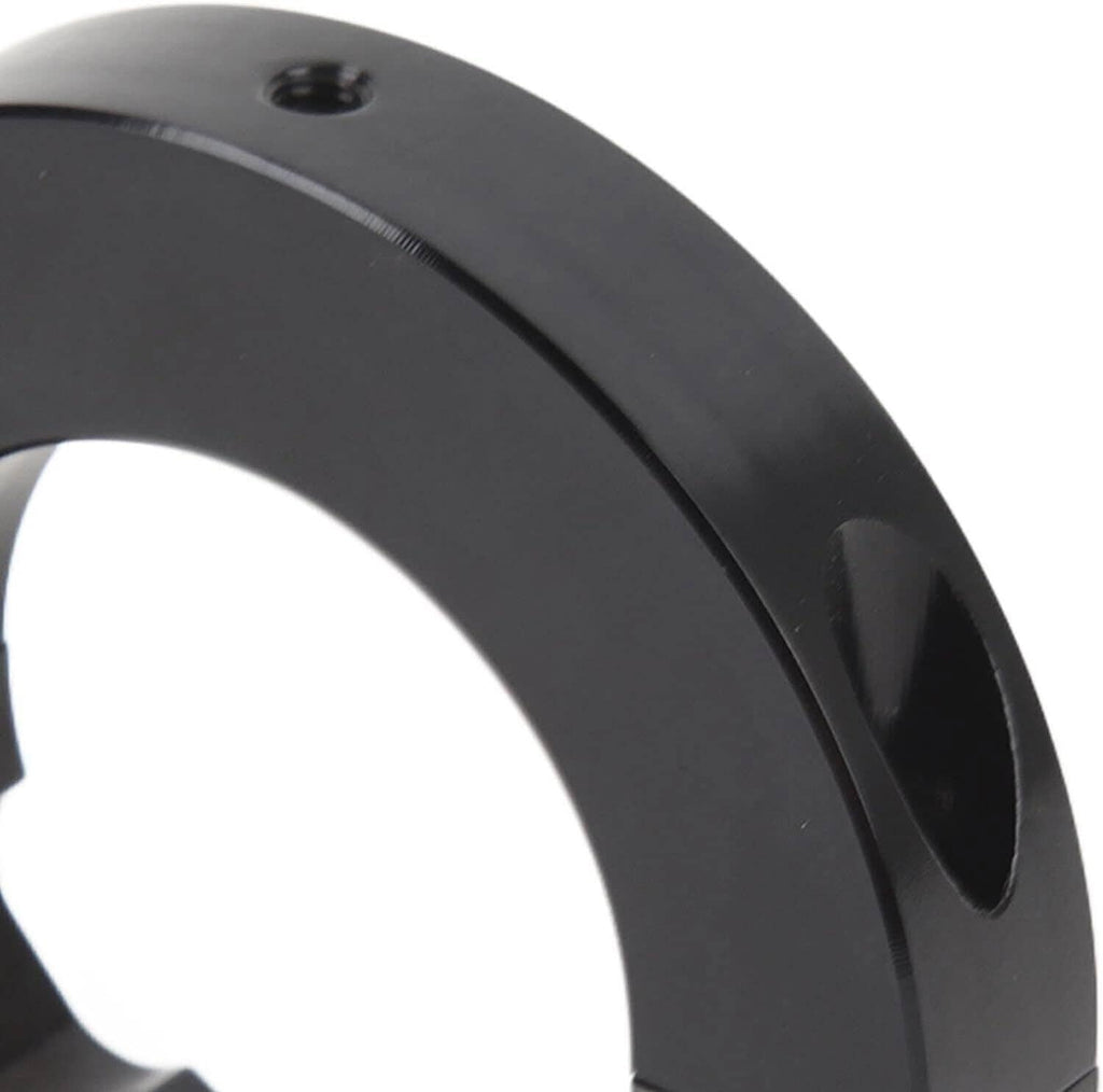 Black steering column mounting bracket with circular opening and round top mounting hole.