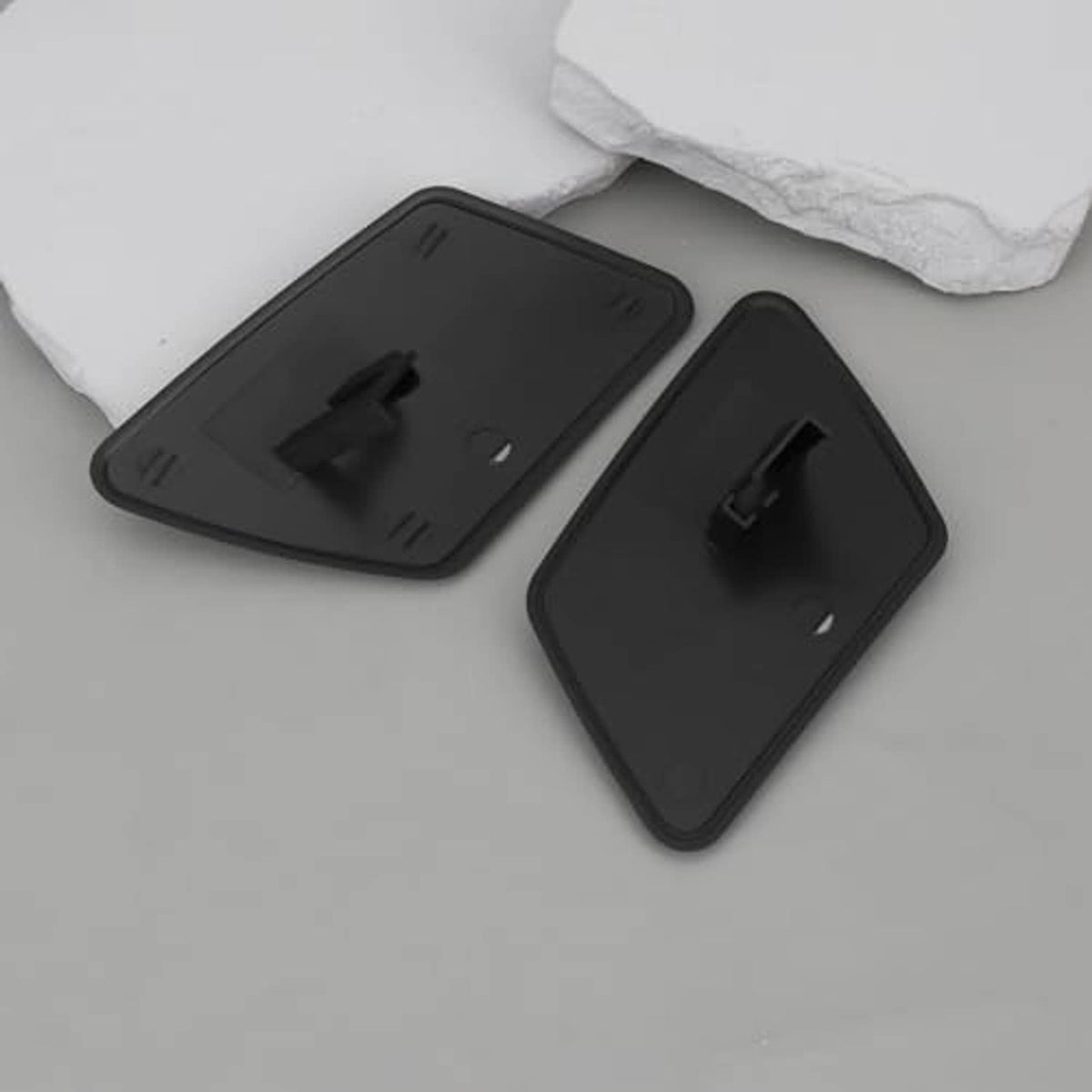 Front headlight washer nozzle cover caps, left and right, matte black plastic pair