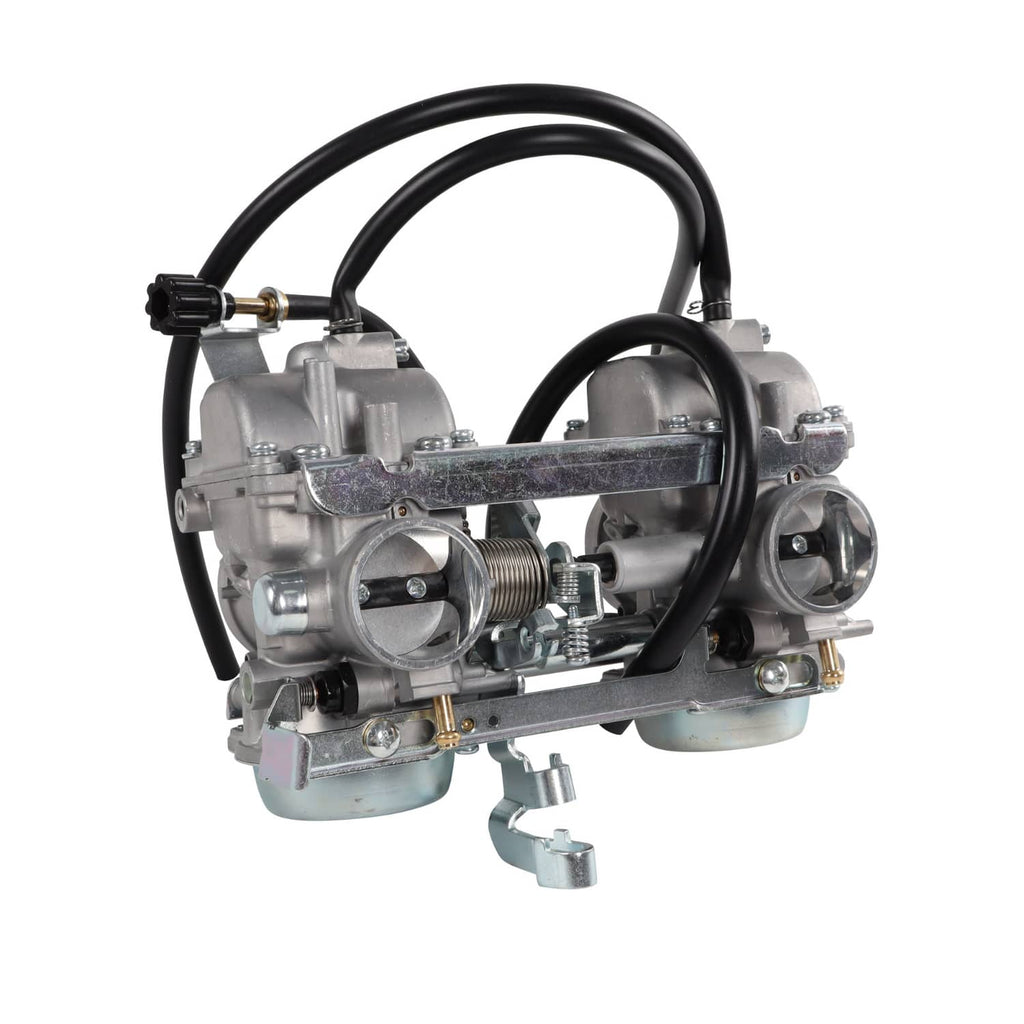 Carburetor assembly with metal body, black hoses, and throttle linkage