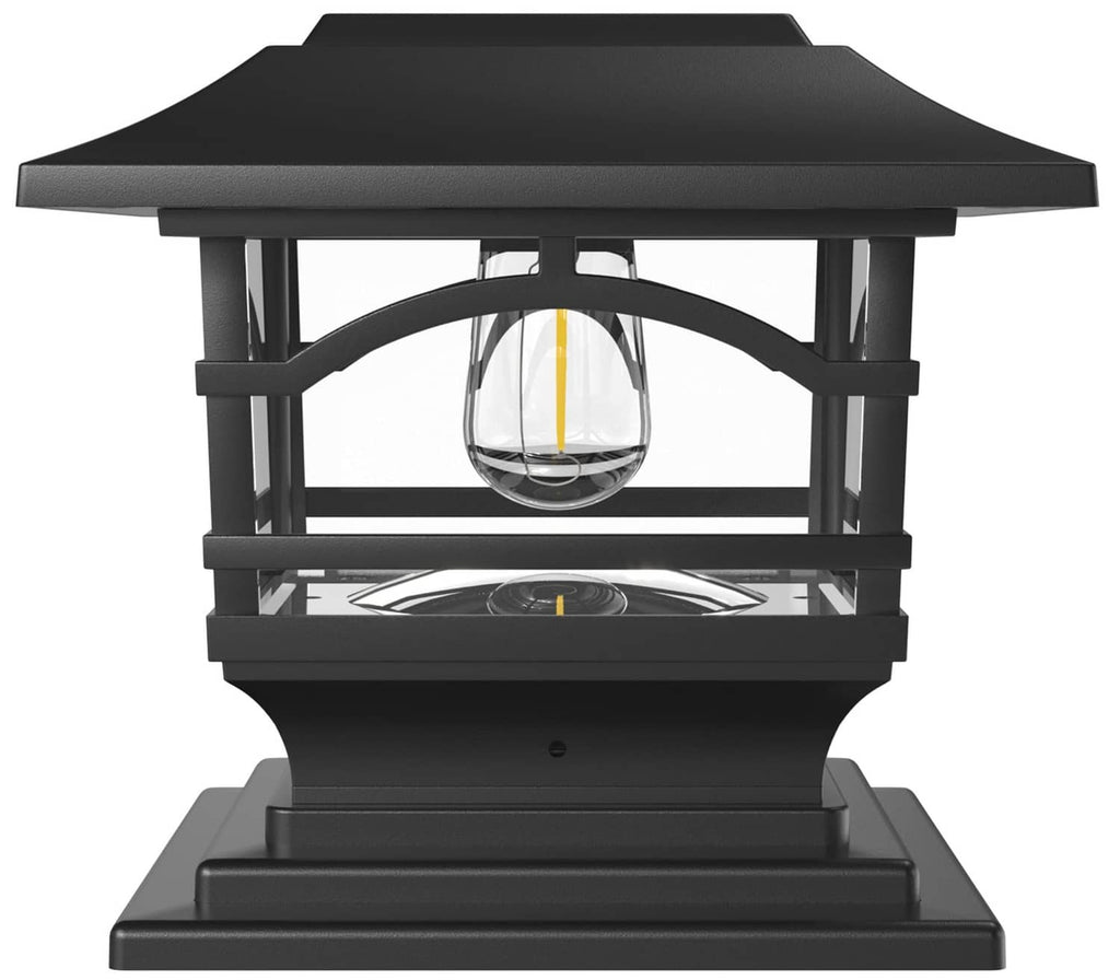 Black solar outdoor post cap light with clear glass Edison-style bulb inside a lantern frame