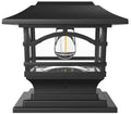 Black solar outdoor post cap light with clear glass Edison-style bulb inside a lantern frame