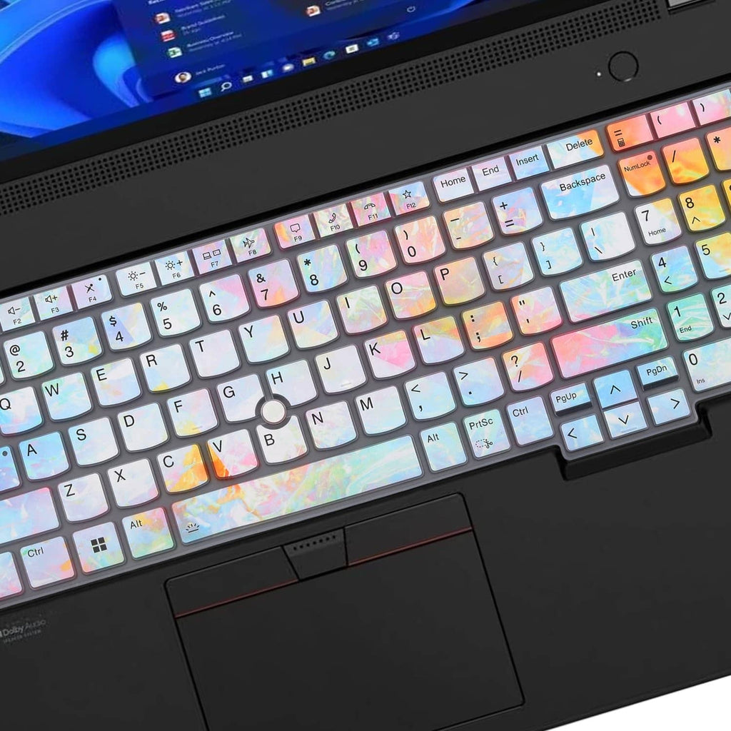 Iridescent laptop keyboard cover with clear cutouts over function and letter keys
