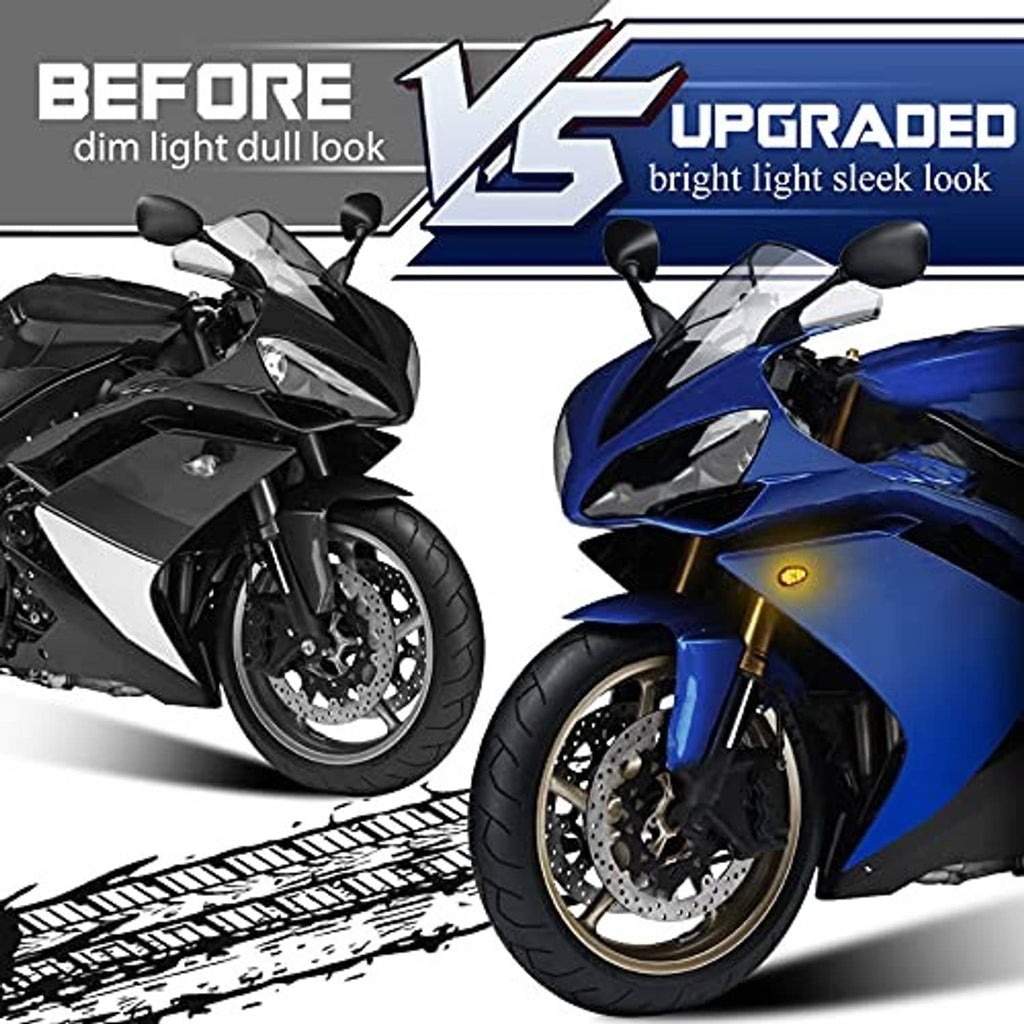 Smoked-lens LED turn signals on motorcycle fairing, amber lens