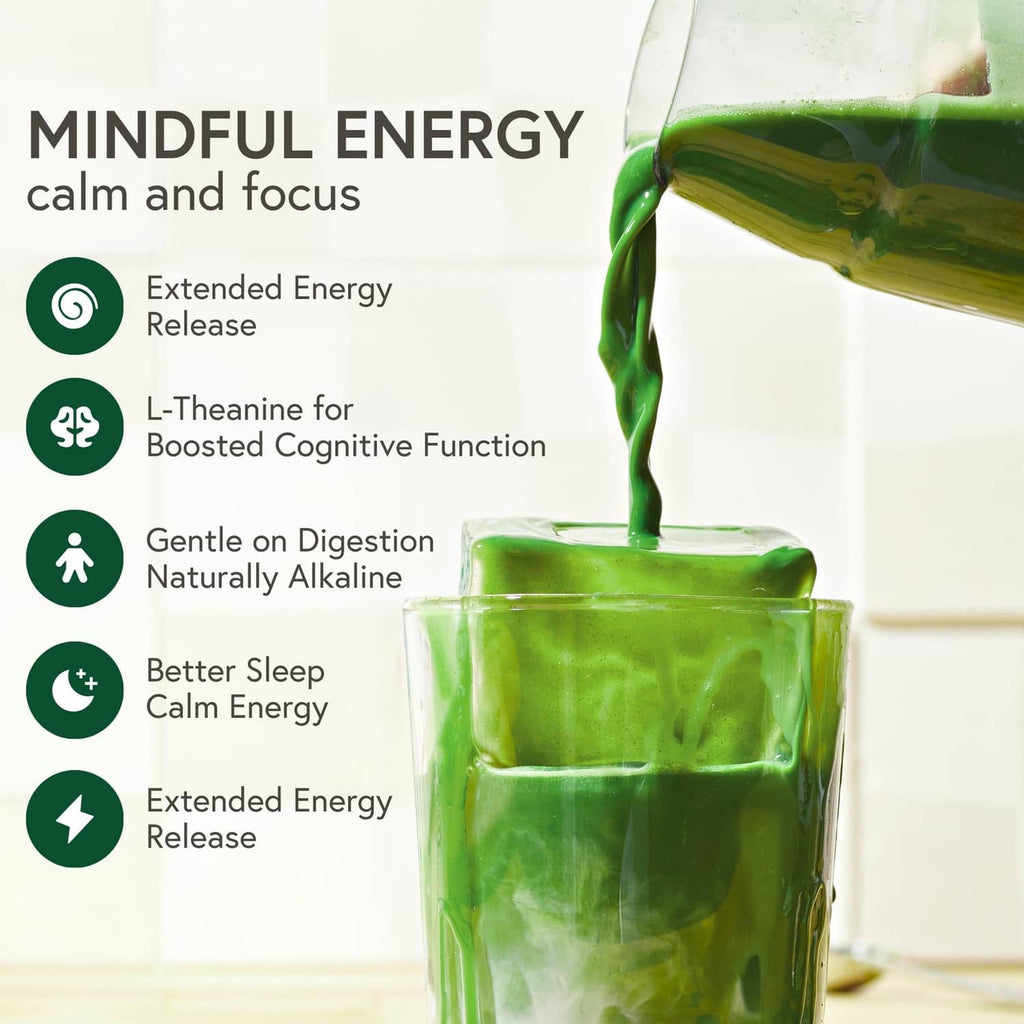 Glass cup filled with green matcha with tea stream pouring into it