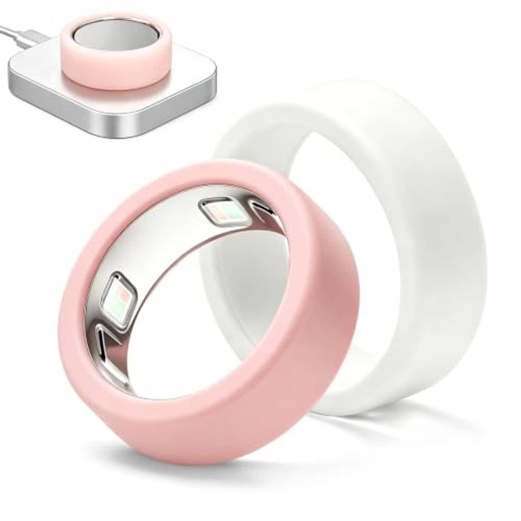 Pink silicone smart ring cover next to a white protective cover insert