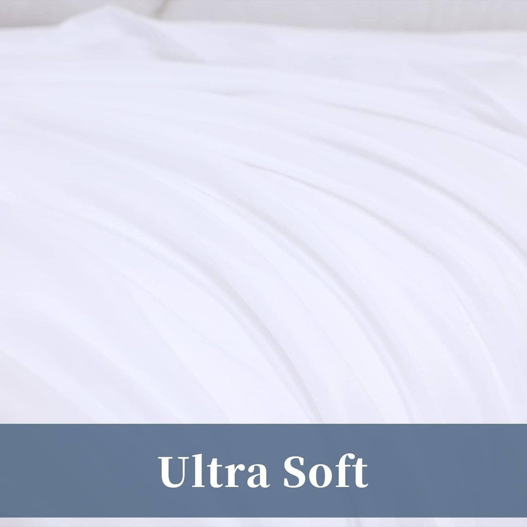 White flat sheet fabric close-up with smooth pleats and soft texture