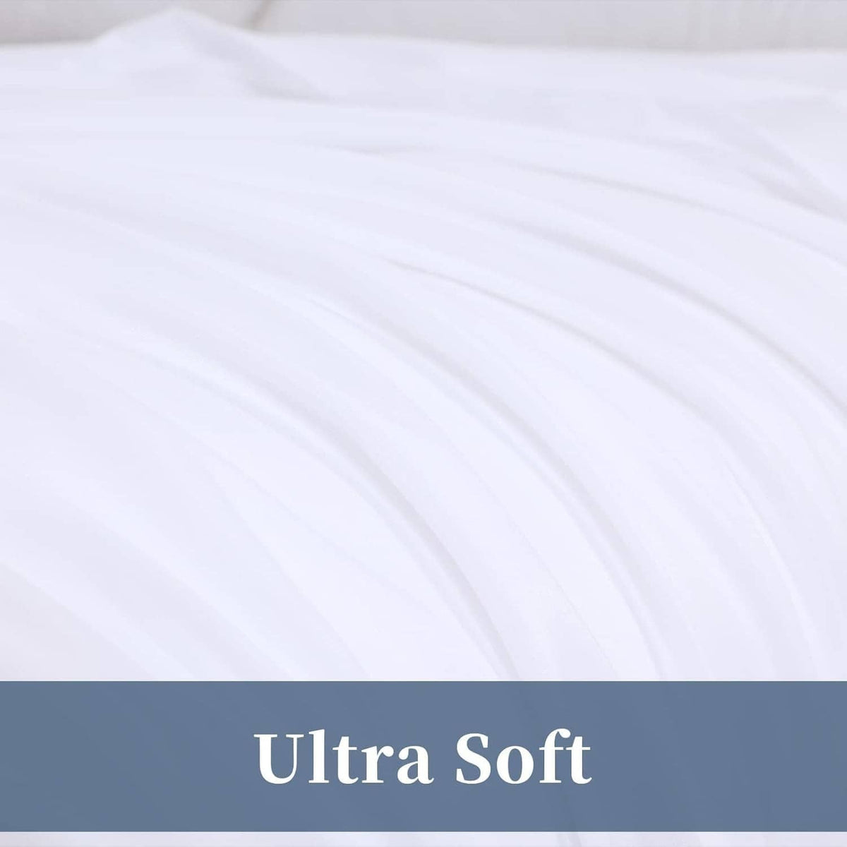 White flat sheet fabric close-up with smooth pleats and soft texture