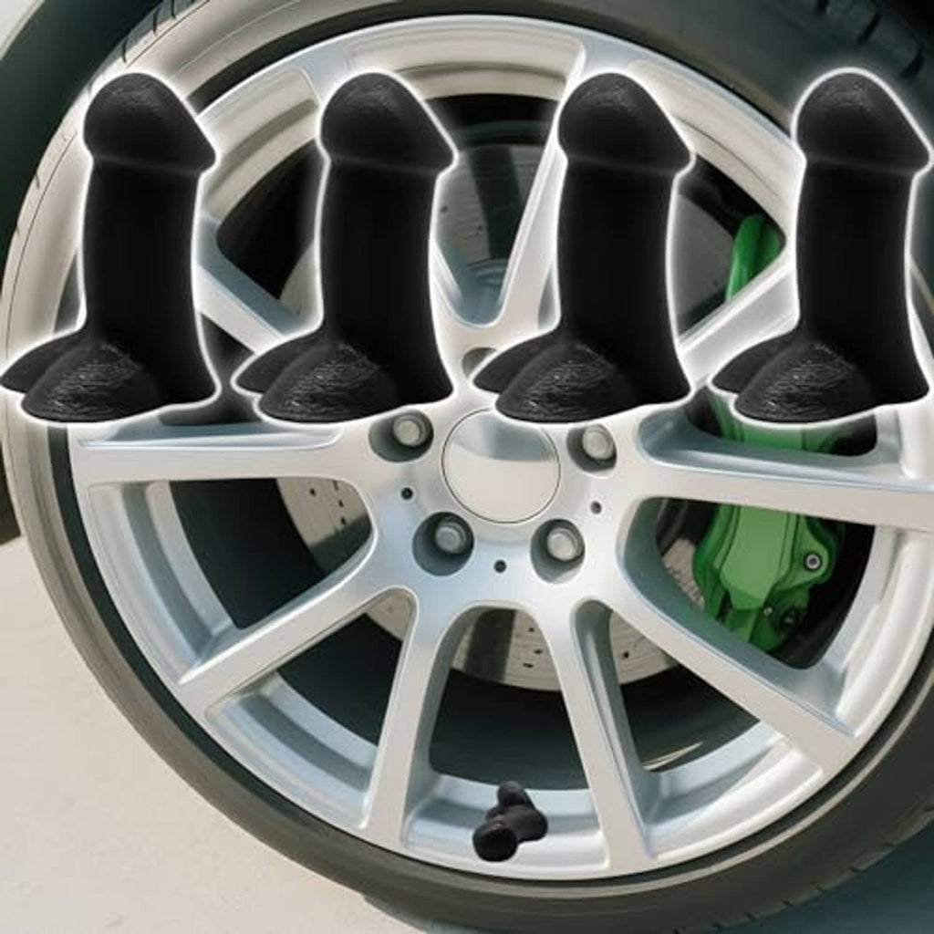 Black cone-shaped tire valve stem caps on a wheel rim, four-piece set