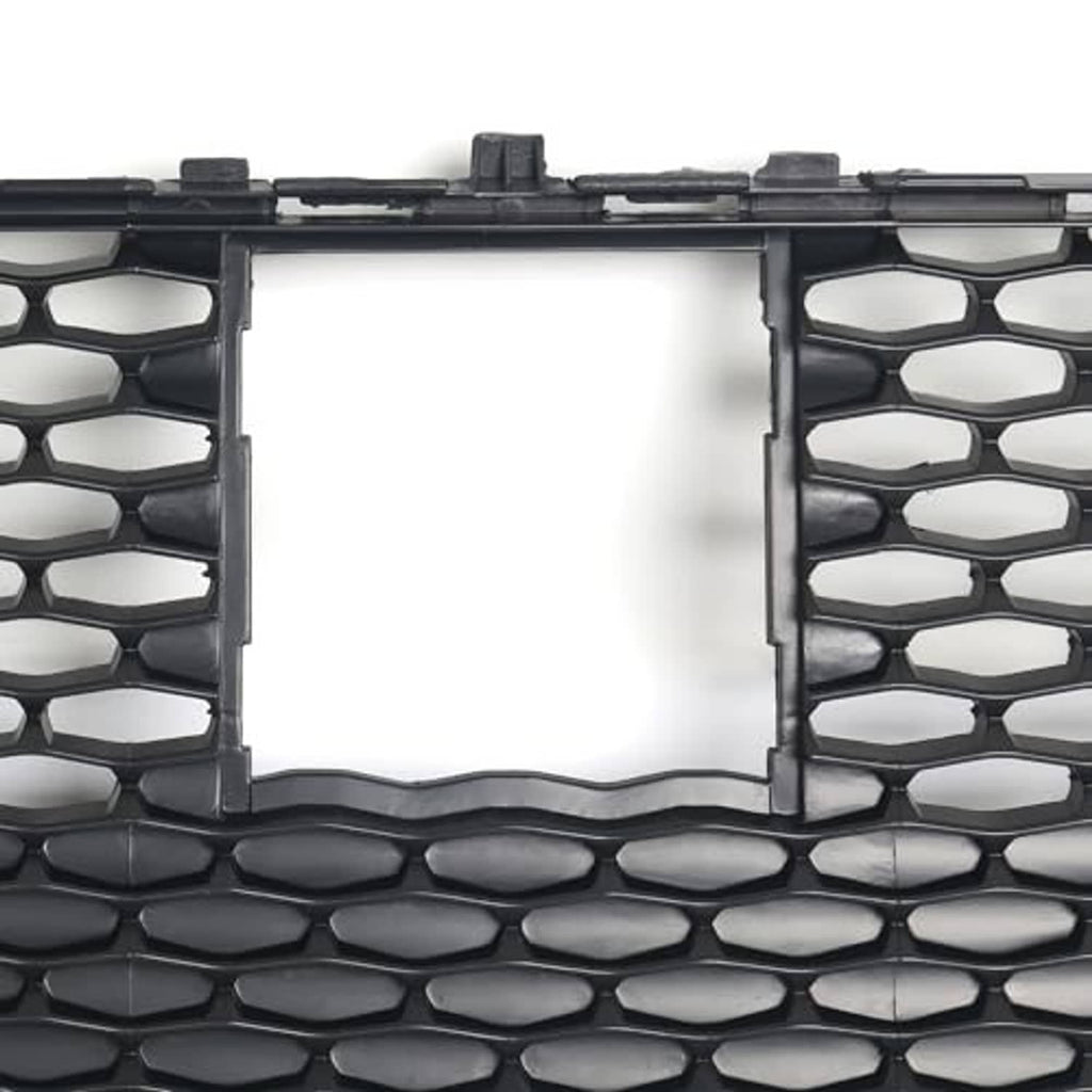 Front grille insert with silver rectangle surround on black honeycomb mesh.