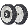 Rear wheel set with black tires, white rims, and black plastic gear hubs