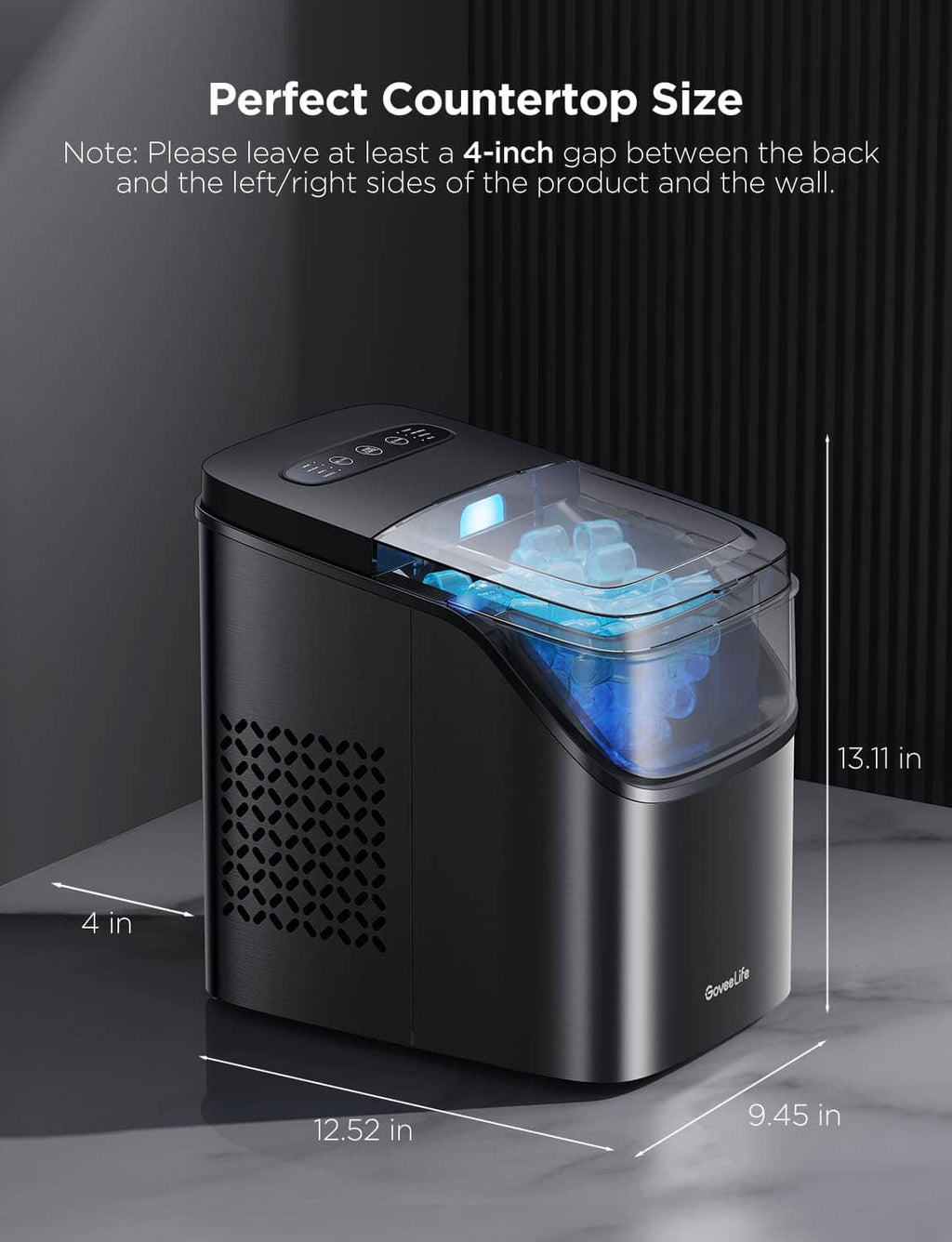 Compact countertop ice maker with blue-lit viewing window and black stainless body