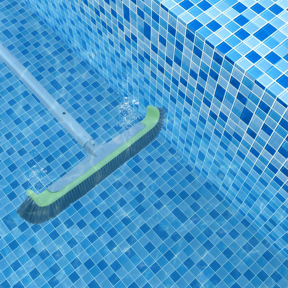 Pool wall scrub brush with black bristles contacting blue tiled pool surface