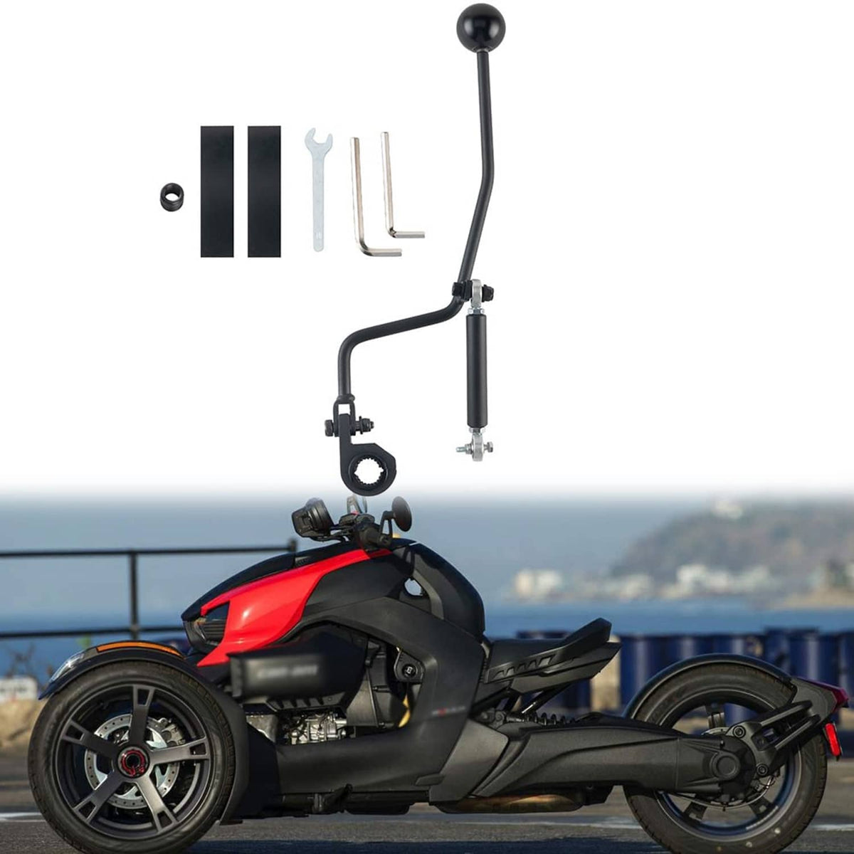 Installed forward/reverse hand shifter lever on black three-wheeled motorcycle with red trim