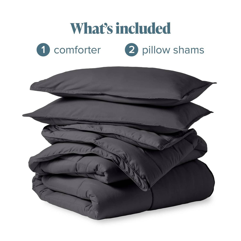 Folded grey comforter and 2 pillow shams set, full bedding