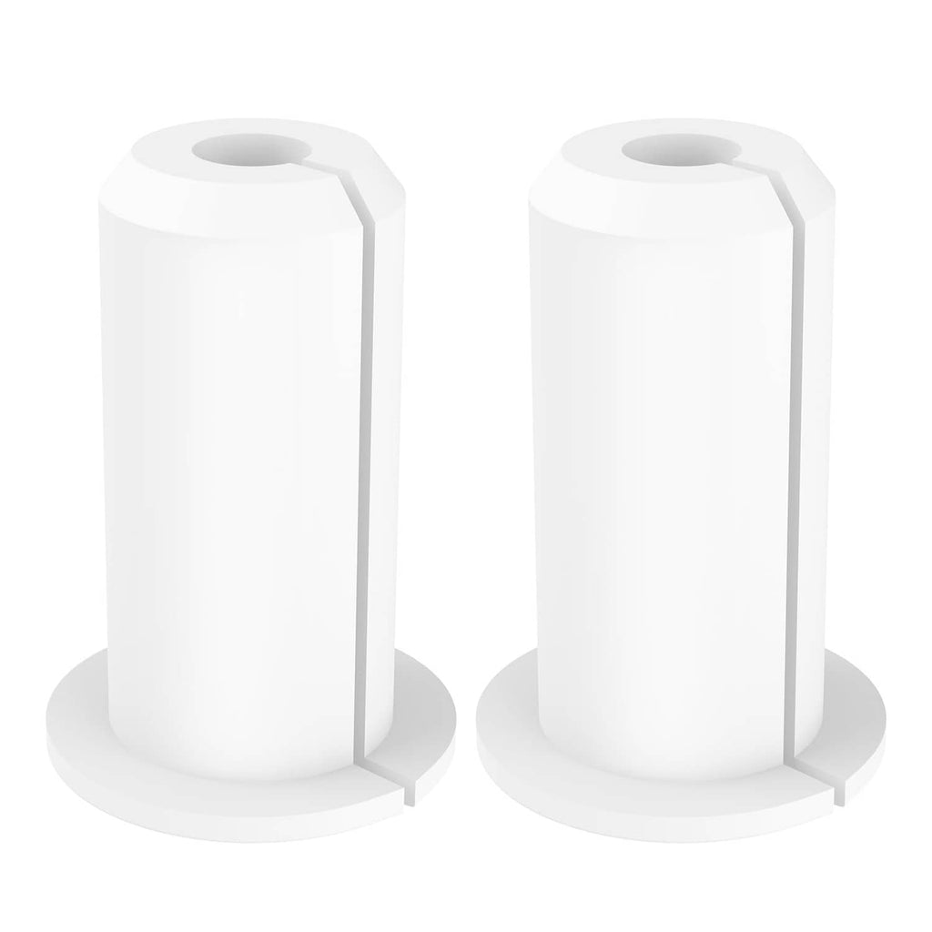 Two white cable pass-through grommets with round top openings for wall mounting