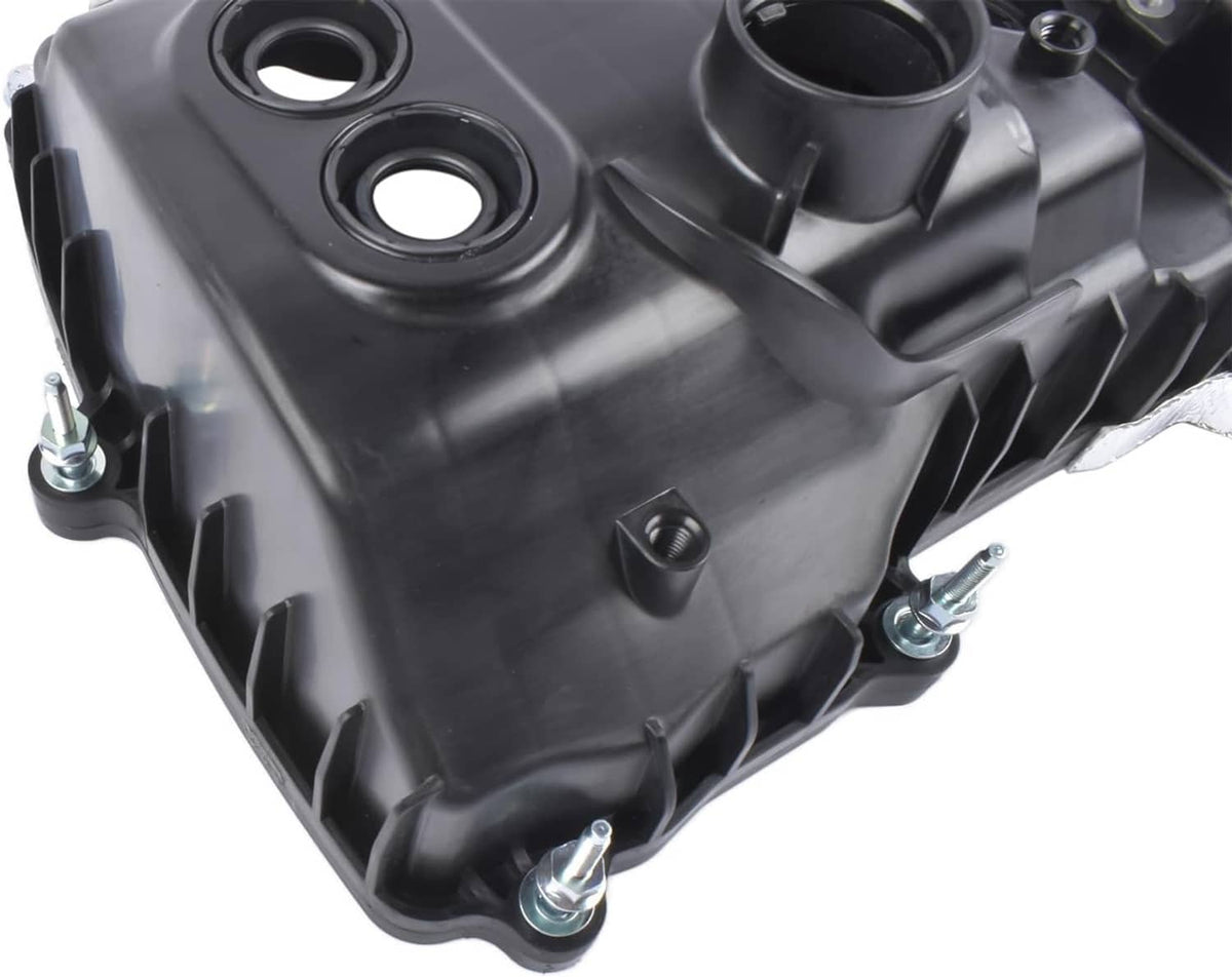 Left-side valve cover underside with mounting hardware holes and circular gasket ports