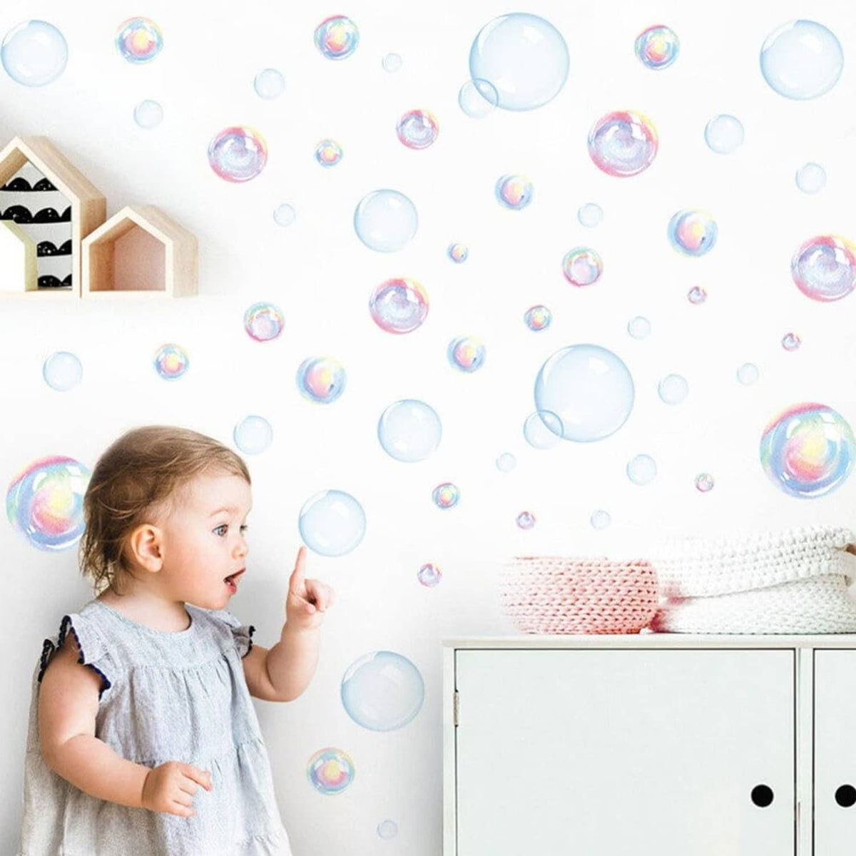 Rainbow bubble wall decals covering a wall with floating iridescent bubbles