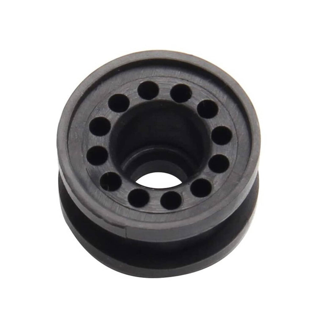 Black grommet bushing with circular center hole and side mounting holes