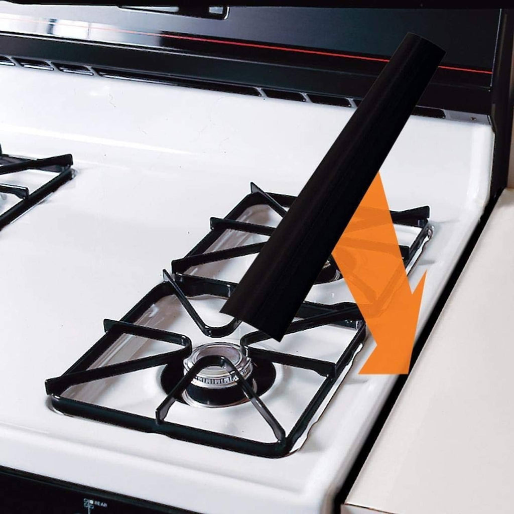 Black stove gap cover strip placed along the front cooktop gap to help stop debris.
