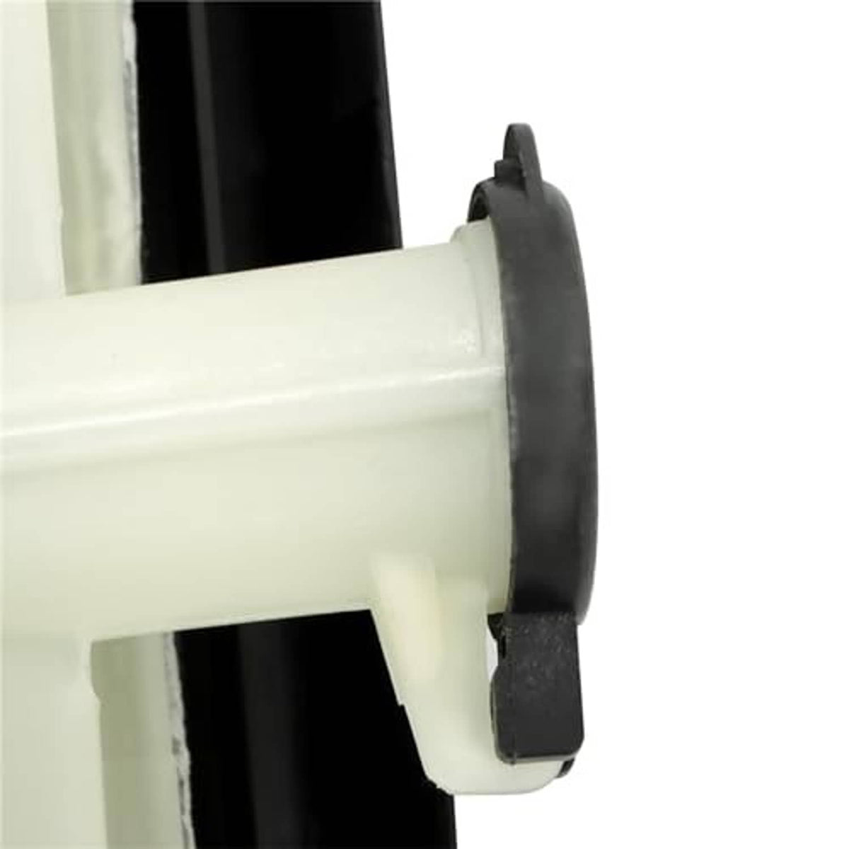 Radiator cooling fan reservoir mount close-up, white housing with black rubber seal
