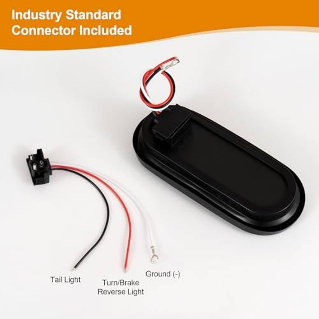 Oval red LED tail light with wiring harness and connector pigtail included
