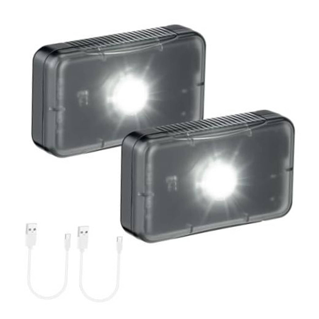 Two dark rectangular rechargeable LED sensor lights with bright front LEDs