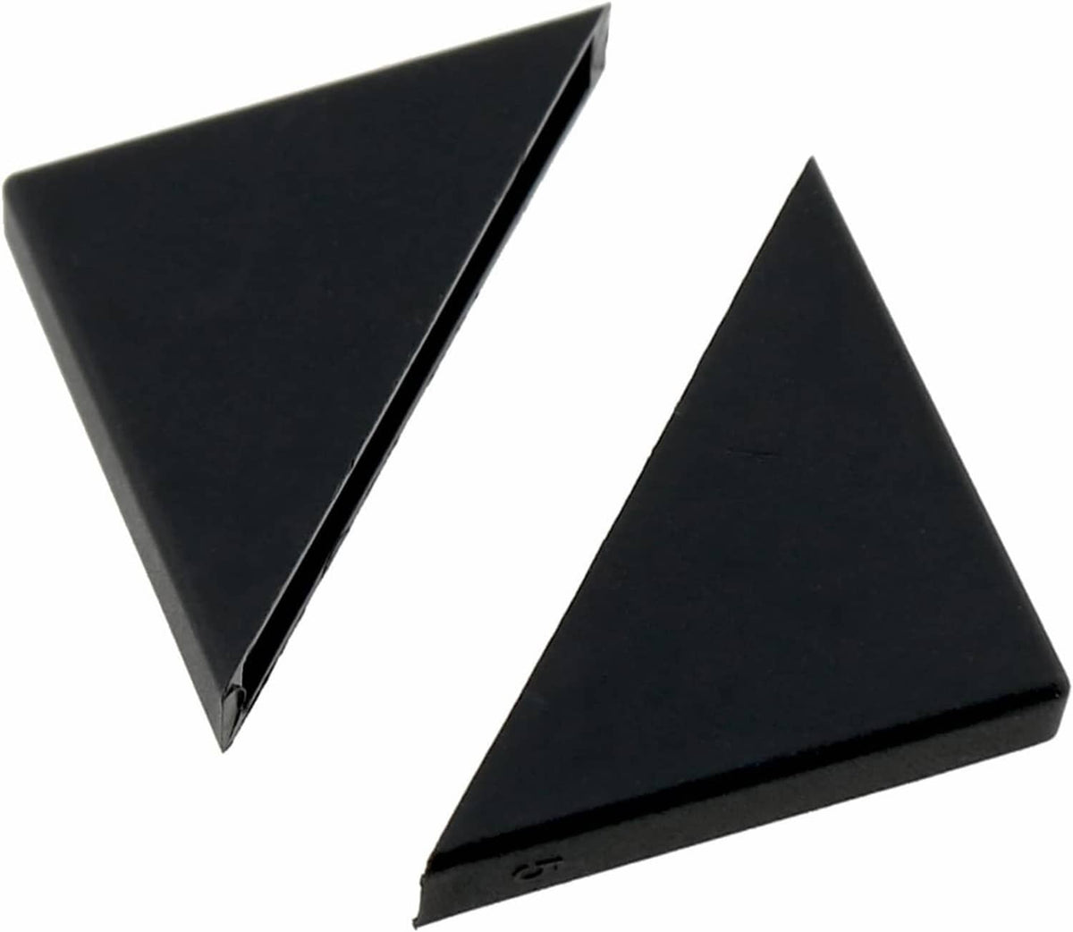 Black triangular corner protector for table edges, close-up of two pieces