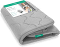 Breathable grey bassinet cover with quilted cloud pattern and silver zipper trim