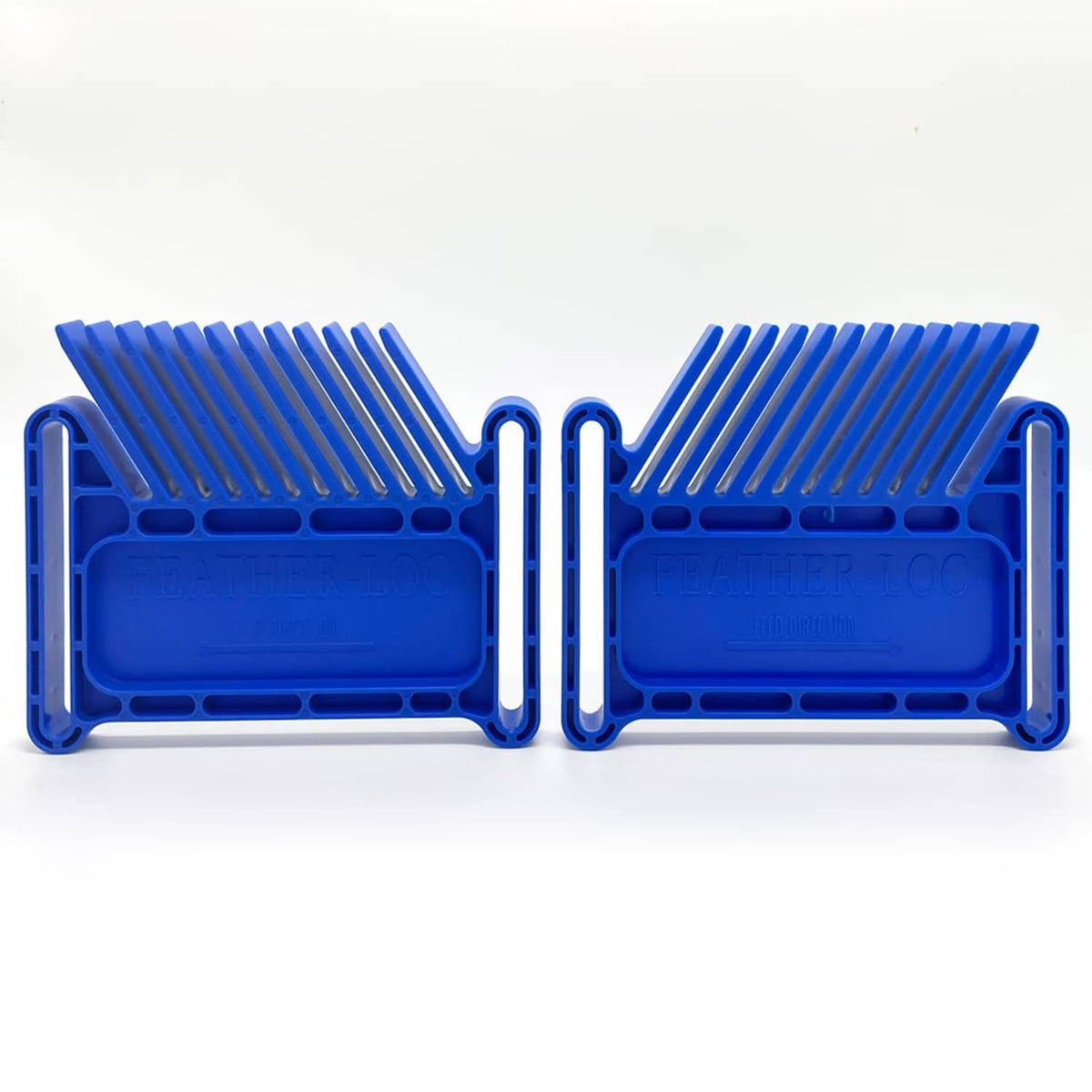 Two connected blue stackable featherboards with comb teeth and side handles