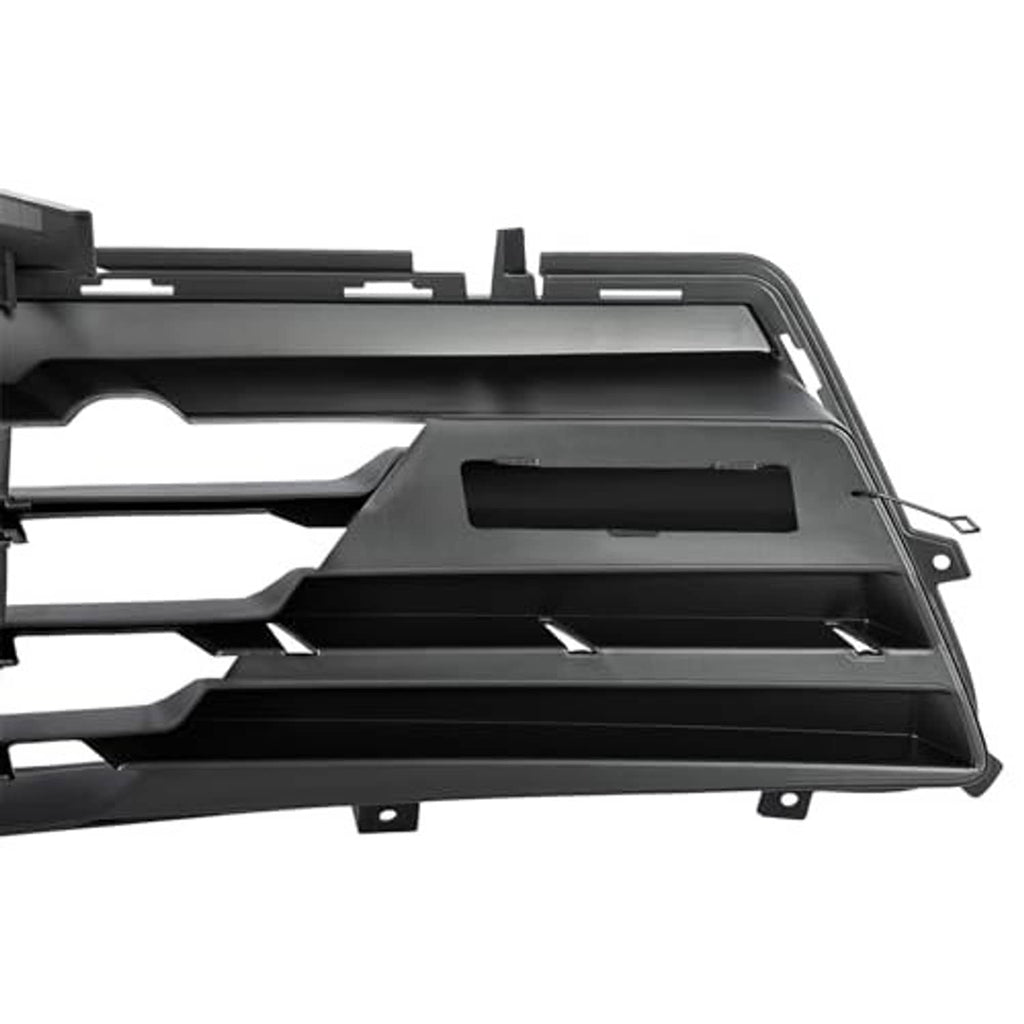 Close-up of black grille housing with vent openings and mounting tabs
