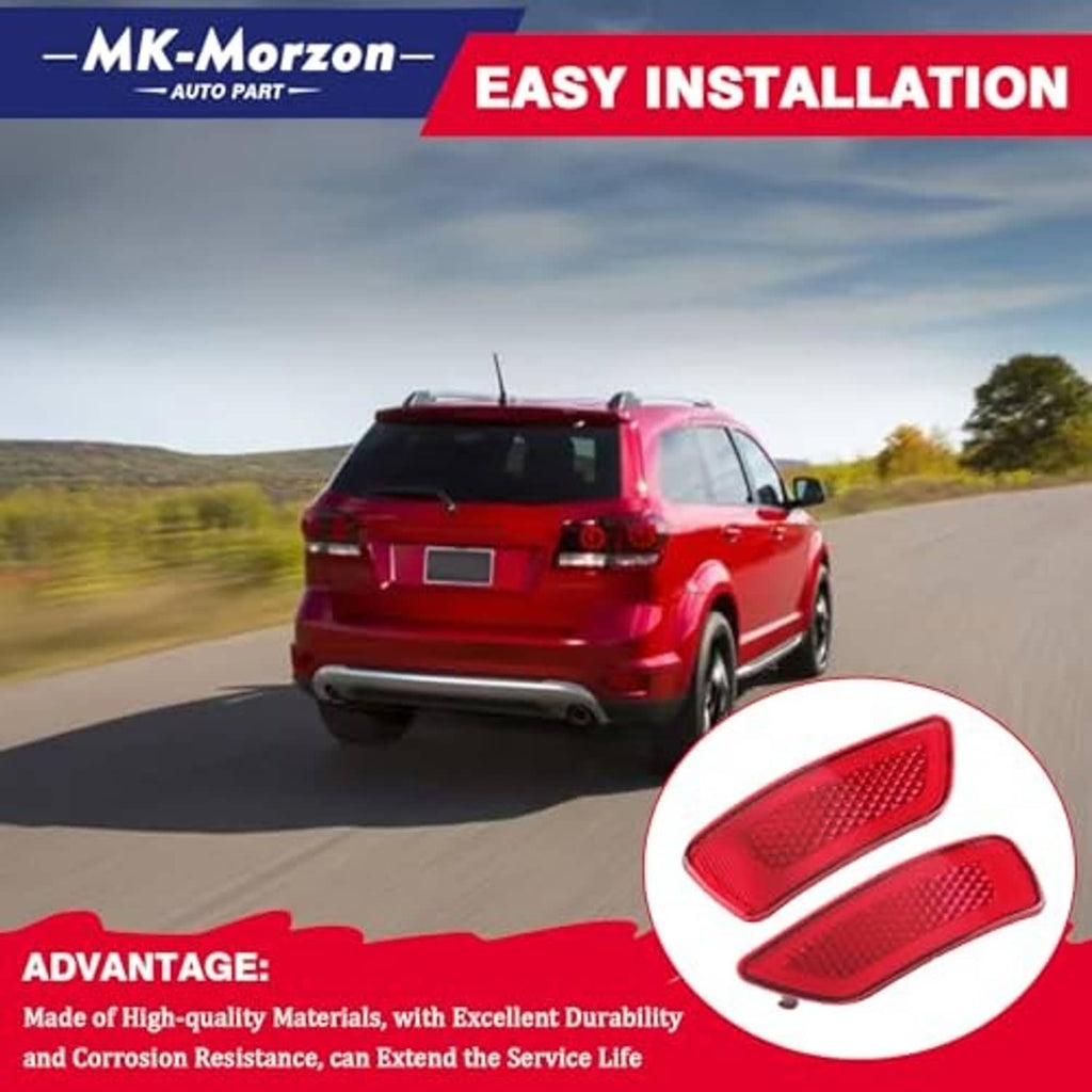Two red rear bumper reflector lamps with textured teardrop lenses
